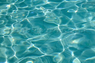 Shimmering surface of water in swimming pool