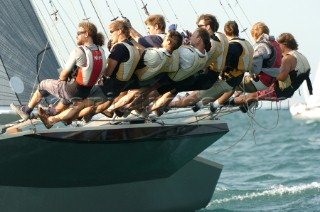 Crew hiking out on skiff, Lake Garda