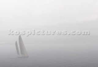 Sailing yachts in thick fog. Porto Cervo, Sardinia