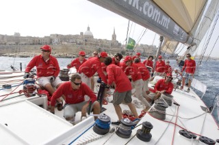 Teamwork on maix racing yacht during the Rolex Middle Sea Race 2005.