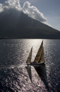 Steinlager II sails passed Stromboli Island during the Rolex Middle Sea Race 2005