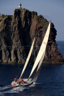 Steinlager II sails passed Stromboli Island during the Rolex Middle Sea Race 2005