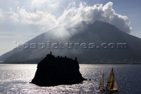 Steinlager II sails passed Stromboli Island during the Rolex Middle Sea Race 2005