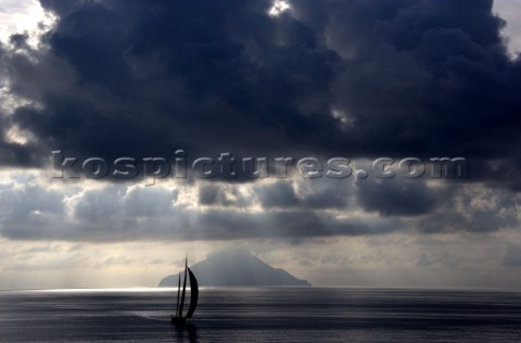 Steinlager II sails passed Filicudi Island during the Rolex Middle Sea Race 2005