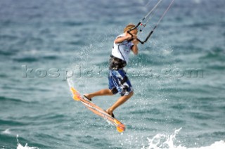 Kitesurfer gets air in strong winds