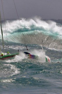 Yacht in large waves and rough sea