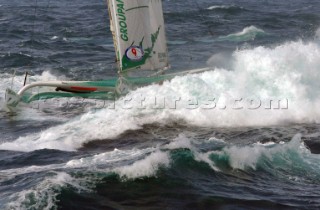 Yacht in large waves and rough sea