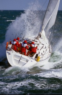 Yacht in large waves and rough sea