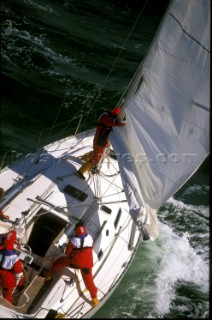 Yacht in large waves and rough sea