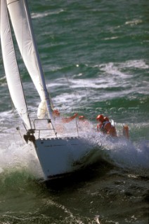 Yacht in large waves and rough sea