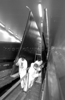 Black and white images of molds and workmanship and construction during superyacht building