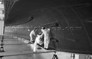 Black and white images of molds and workmanship and construction during superyacht building