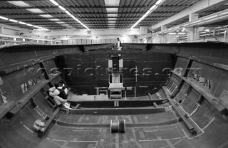 Black and white images of molds and workmanship and construction during superyacht building