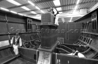 Black and white images of molds and workmanship and construction during superyacht building