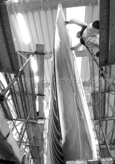 Black and white images of molds and workmanship and construction during superyacht building