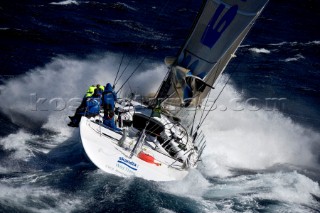 Skandia sailing along the Tasmanian coast, Australia,Dec. 28, 2005. 85 yachts of all sizes battled for this years line honors in this the 61st running of the world famous race.