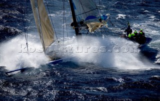 Skandia sailing along the Tasmanian coast, Australia,Dec. 28, 2005. 85 yachts of all sizes battled for this years line honors in this the 61st running of the world famous race.