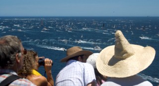 Sailing and racing yachts leave Sydney harbour in the 2005 Rolex Sydney Hobart race