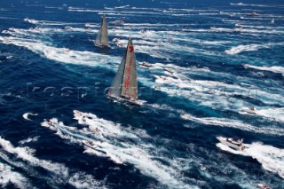 Sailing and racing yachts leave Sydney harbour in the 2005 Rolex Sydney Hobart race