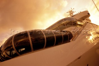 Reflections in graphic windows and observation area on a superyacht