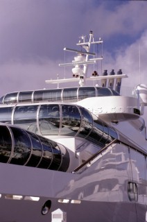 Reflections in graphic windows and observation area on a superyacht