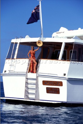 Female model onboard the superyacht Achilles