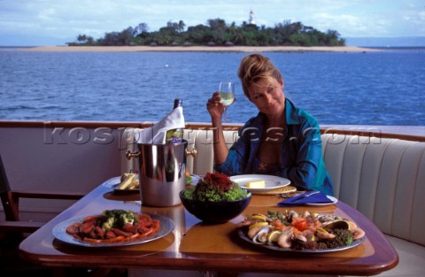 Female model onboard the superyacht Achilles