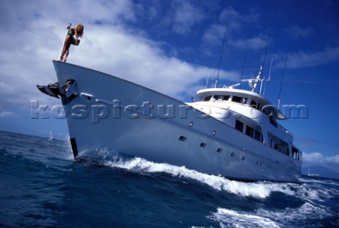Female model onboard the superyacht Achilles