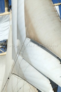 Graphic sails and shapes of the masts and sails of a cruising superyacht cruise ship