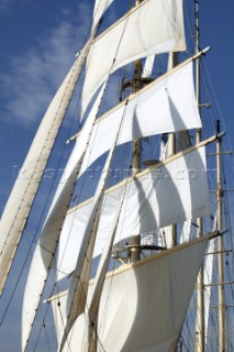 Graphic sails and shapes of the masts and sails of a cruising superyacht cruise ship