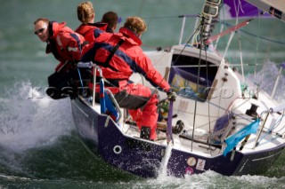 COWES, ENGLAND - AUGUST 1: Ben Walker, tactician onboard the J80 sportsboat Savage Sailing Team, hiking hard on the side of the yacht whilst calling windshifts and gusts during Day 4 of Skandia Life Cowes Week 2006. The yacht went on to a 2nd place to yacht Abstention which won by 12 seconds. (Photo by Kos/Kos Picture Source via Getty Images)