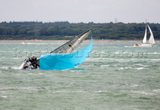 COWES, ENGLAND - AUGUST 1: Yacht GBR79 Sail 4 Cancer in a dramatic broach during Day 4 of Skandia Life Cowes Week 2006. (Photo by Kos/Kos Picture Source via Getty Images)