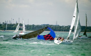 COWES, ENGLAND - AUGUST 1: Yacht GBR9484 Minx 2 racing in IRC Class 4 broaching severley in a 30 knot gust on Day 4 of Skandia Life Cowes Week 2006. (Photo by Kos/Kos Picture Source via Getty Images)