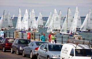 COWES, ENGLAND - JULY 29: Sailors in the 100 boat Laser SB3 Class short tack along the shoreline during Day 1 of Skandia Life Cowes Week 2006. (Photo by Kos/Kos Picture Source via Getty Images)