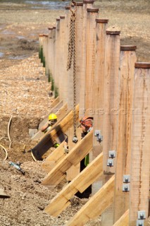 Sea defence building in whitstable kent raising the level of the beach some meters to counter rising sea level and erosion new breakwater being built