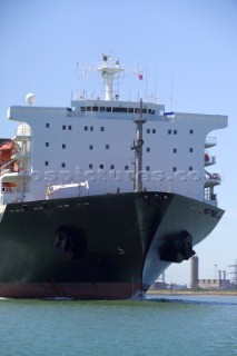 A container ship fully laden near to port