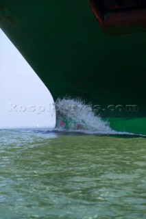 A container ship fully laden near to port