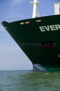 A container ship fully laden near to port