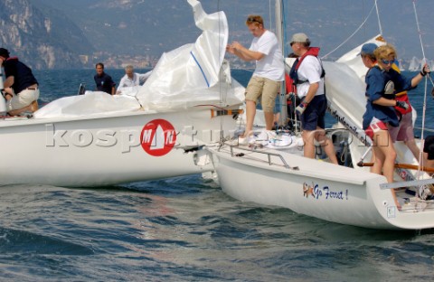 Incognito and Go Ferret following their crash during the 1720 Euro Championships in Lake Garda Septe