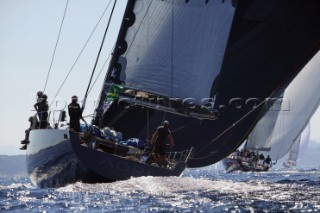 PORTO CERVO, SARDINIA - SEPT 6th 2006: The black 24 metre Wally maxi yacht AORI (MLT) reaching under spinnaker towards the Madellena Islands at the Maxi Yacht Rolex Cup 2006 in Porto Cervo, Sardinia. Wally Yachts, the yacht builder and shipyard owned by Italian businessman Luca Bassani, are the most modern and technologically advanced yachts in the world. (Photo by Tim Wright/Kos Picture Source via Getty Images)