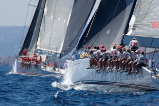 PORTO CERVO, SARDINIA - SEPT 9th 2006: The two 100ft canting keel super maxis Wild Oats from Australia (left) owned by Robert Oatley and Alfa Romeo from New Zealand (right) owned by Neville Crighton race closely on a spinnaker reach duing the Maxi YAcht Rolex Cup on September 9th 2006. Wild Oats is winning the regatta by 4 points overall. The Maxi Yacht Rolex Cup is the largest maxi yacht regatta in the world, which attracts the fastest and most expensive sailing yachts to Porto Cervo, Sardinia bi-annually. (Photo by Gilles Martin-Raget/Kos Picture Source via Getty Images)