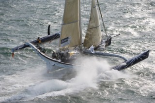 PORT de FECAMP, FRANCE - SEPT 9th 2006: The Open 60 trimaran GITANA 11 (Fra) skippered by the famous French multihull sailor Loick Peyron racing in the Grand Prix de Fecamp on September 9th 2006. GITANA 11 finished 2nd overall. The Grand Prix de Port de Fecamp is part of the Multi Cup 60 Cafe Ambassador. (Photo by Gilles Martin-Raget/Kos Picture Source via Getty Images)