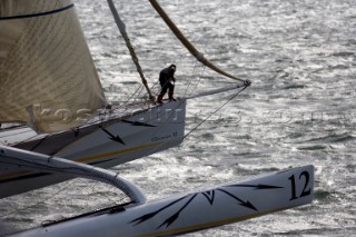 PORT de FECAMP, FRANCE - SEPT 9th 2006: The Open 60 trimaran GITANA 12 (Fra) skippered by Thierry Duprey de Vorsent racing in the Grand Prix de Fecamp on September 9th 2006. GITANA 12 finished 4th overall. The Grand Prix de Port de Fecamp is part of the Multi Cup 60 Cafe Ambassador. (Photo by Gilles Martin-Raget/Kos Picture Source via Getty Images)