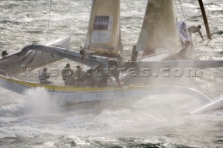 PORT de FECAMP, FRANCE - SEPT 9th 2006: The Open 60 trimaran GITANA 12 (Fra) skippered by Thierry Duprey de Vorsent racing in the Grand Prix de Fecamp on September 9th 2006. GITANA 12 finished 4th overall. The Grand Prix de Port de Fecamp is part of the Multi Cup 60 Cafe Ambassador. (Photo by Gilles Martin-Raget/Kos Picture Source via Getty Images)