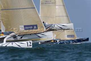 PORT de FECAMP, FRANCE - SEPT 9th 2006: The Open 60 trimaran GITANA 12 (Fra) skippered by Thierry Duprey de Vorsent racing in the Grand Prix de Fecamp on September 9th 2006. GITANA 12 finished 4th overall. The Grand Prix de Port de Fecamp is part of the Multi Cup 60 Cafe Ambassador. (Photo by Gilles Martin-Raget/Kos Picture Source via Getty Images)