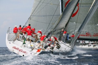 PORTO CERVO, SARDINIA - SEPT 9th 2006: The canting keel maxi Wild Oats of Australia cross tacking behind her near sistership Alfa Romeo from New Zealand during racing in the Maxi Yacht Rolex Cup on September 9th 2006. Alfa Romeo won the IRC Racing Division overall. The Maxi Yacht Rolex Cup is the largest maxi regatta in the world, which attracts the worlds fastest and most expensive sailing yachts to Porto Cervo, Sardinia bi-annually. (Photo by Tim Wright/Kos Picture Source via Getty Images)