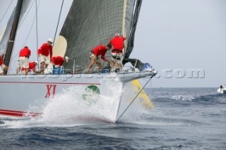 PORTO CERVO, SARDINIA - SEPT 9th 2006: The foredeck crew of the canting keel maxi Wild Oats (AUS) prepare the asymmetric spinnaker as they round the windward mark during racing in the Maxi Yacht Rolex Cup on September 9th 2006. Wild Oats won the division overall. The Maxi Yacht Rolex Cup is the largest maxi regatta in the world, which attracts the worlds fastest and most expensive sailing yachts to Porto Cervo, Sardinia bi-annually. (Photo by Tim Wright/Kos Picture Source via Getty Images)