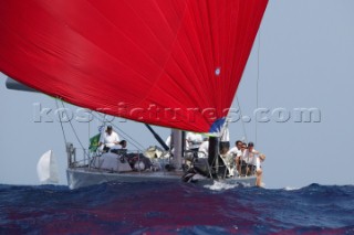 PORTO CERVO, SARDINIA - SEPT 9th 2006: The Wally maxi yacht Indio (ITA) riding the waves under spinnaker during racing in the Maxi Yacht Rolex Cup on September 9th 2006. Indio finished the regatta 7th overall in the Wally Division. The Maxi Yacht Rolex Cup is the largest maxi regatta in the world, which attracts the fastest and most expensive sailing yachts to Porto Cervo, Sardinia bi-annually. (Photo by Tim Wright/Kos Picture Source via Getty Images)