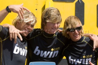 TARIFA, SPAIN - SEPT10th 2006:  From left: Kevin Langeree (Netherlands) is awarded 2nd place, Aaron Hadlow (GB) is pronounced the winner and Youri Zoon (Netherlands) is awarded 3rd place in the BETANDWIN.COM KITESURF PRO. PKRA 2006 WORLD TOUR on September10th in Tarifa in Spain, the mecca for kitesurfing. Aaron Hadlow (GB) is declared World Kitesurf Champion 2006. (Photo by Kirsten Scully/Kos Picture Source via Getty Images)