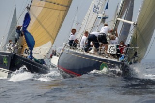 PORTO CERVO, SARDINIA - SEPT 13th 2006:  Swan yachts Aura (USA) and Dioscura (NOR) race round the windward mark during Day 2 of the Rolex Swan Cup on September 13th 2006. Aura finished 2nd and Dioscura 14th. The Rolex Swan Cup, started in 1982, is the principle event on the Swan racing circuit. Nautors Swan yachts, celebrating its 40th year in production, build the best series production yachts afloat. (Photo by Tim Wright/Kos Picture Source via Getty Images)